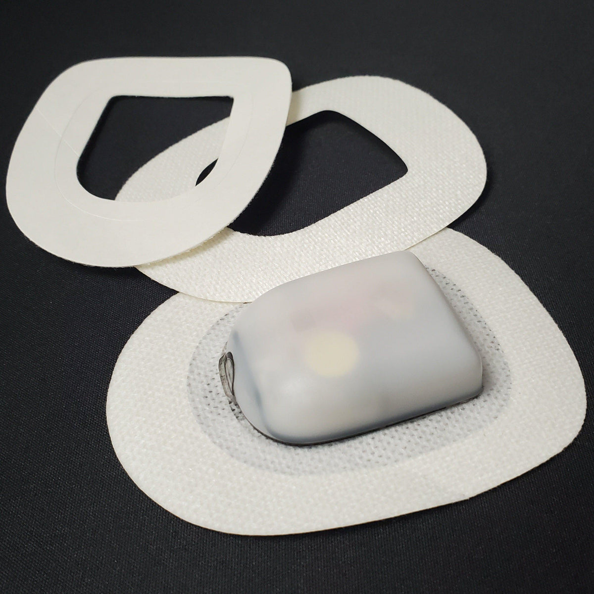 Omnipod 5 Dash and Eros adhesive overpatch for pod edge and snag protection